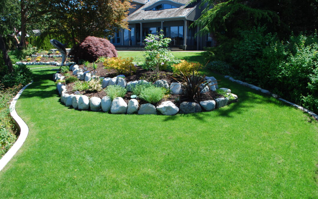 A complete yard with gardens and lawn ( turf ) supplied by tuf-turf in Saanich BC